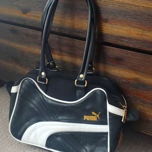 Black and white Puma leather hand bag